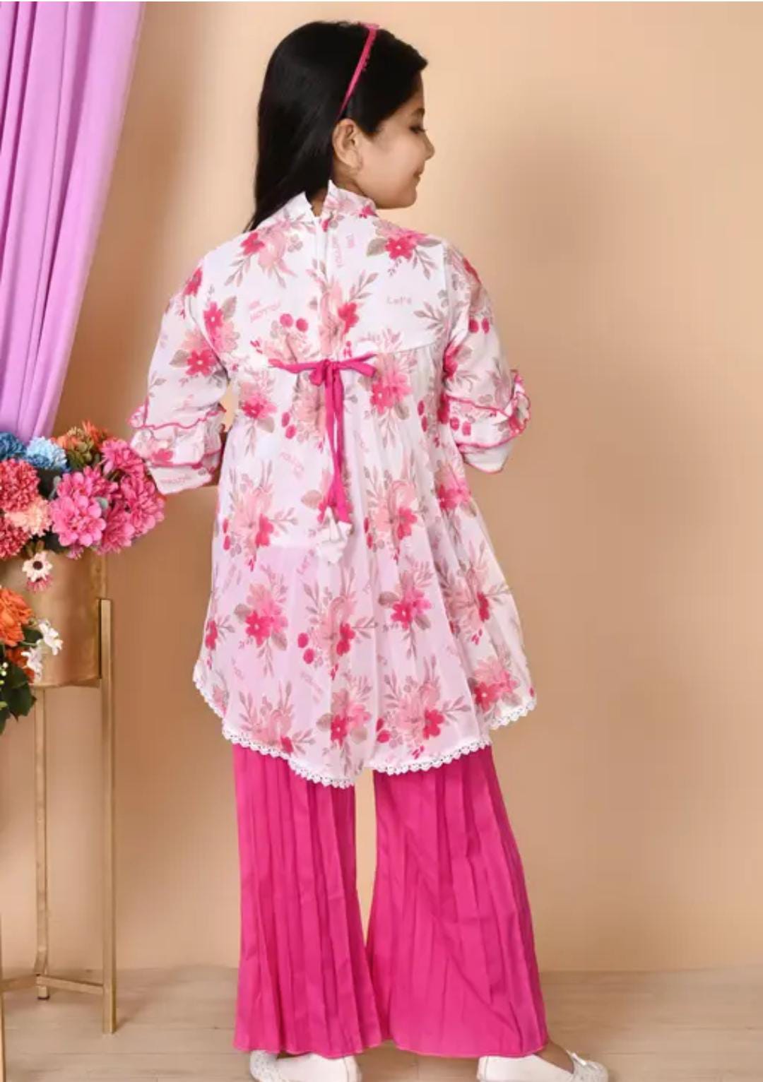 "Beautiful Girls Party Outfit Featuring a Stunning Floral Look"